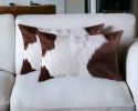Set of Two 12" X 20" Brown and White Genuine Cowhide Throw Pillows