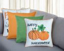 Set of Four 18" Black Orange And White Halloween Pumpkin Text Fabric Throw Pillow Covers